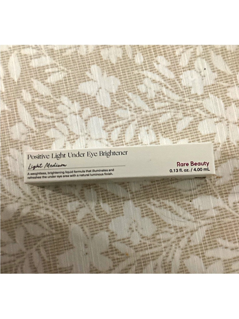 Rare Beauty Positive Light Under Eye Brightener - White and Pink Accents